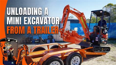 loading a mini excavator on a trailer|unloading mini excavator on trailer.